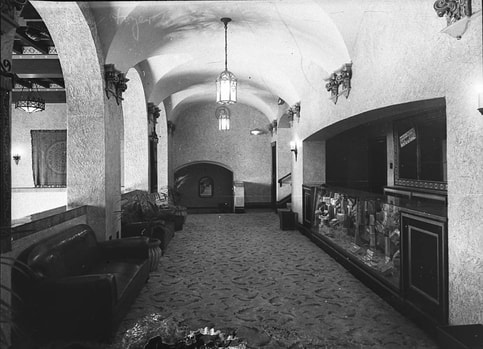 Roxy circle foyer with Spanish Mission detailing